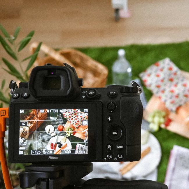 Product photography setup in Adelaide Hills studio showing camera composition of styled brand scene